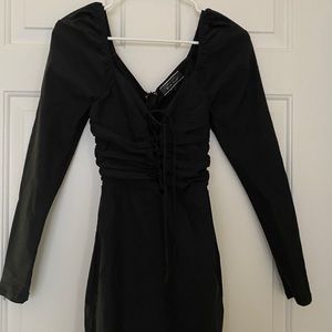 Black body hugging dress
